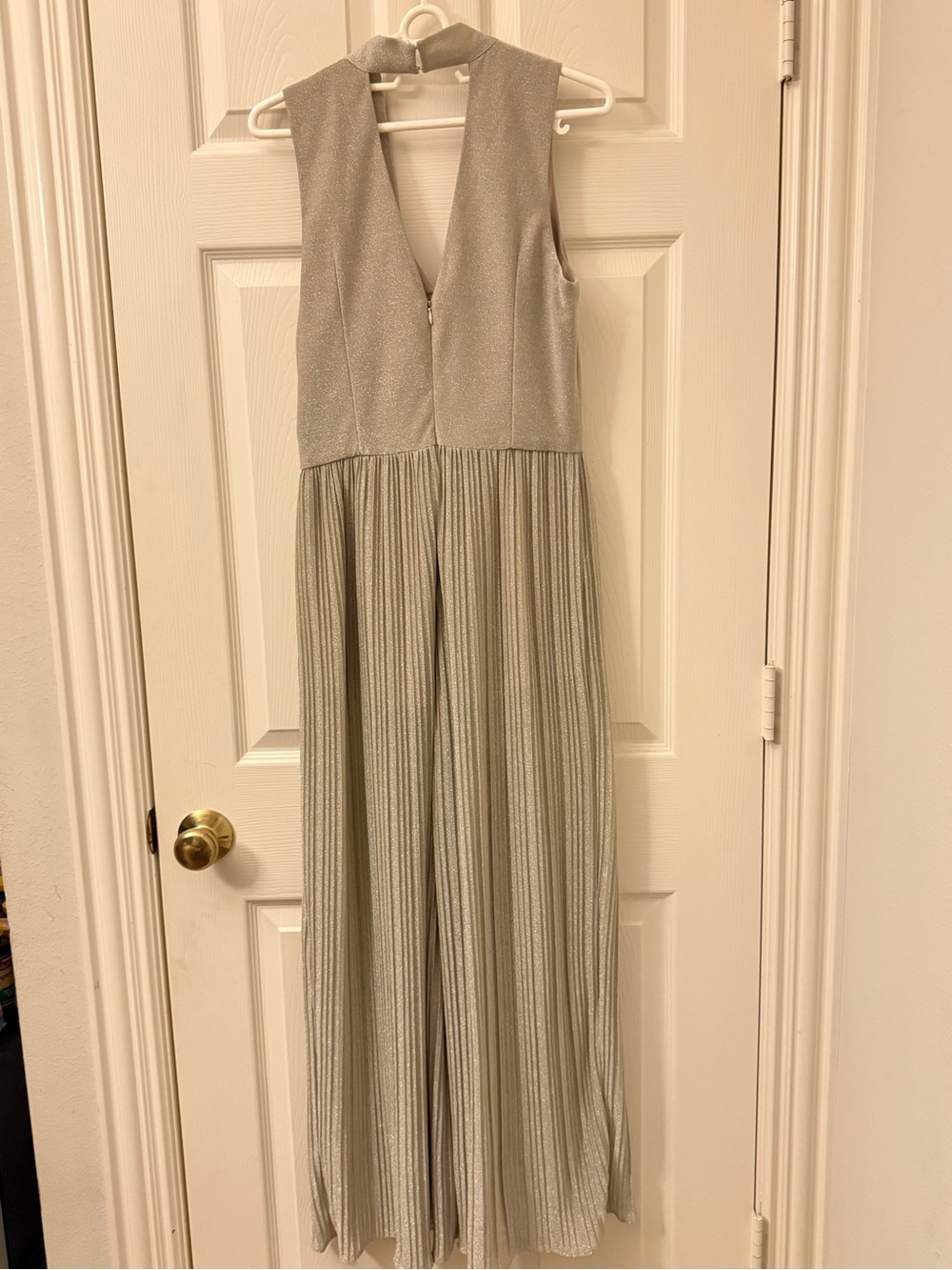 Adelyn Rae Silver Metallic V-Neck Sleeveless Jumpsuit with Flowing Pleated Legs View 3